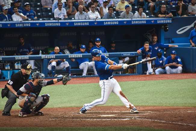 Baseball player swinging a bat